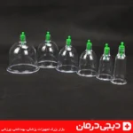 نمای-بالا-از-چیدمان-ست-بادکش-بدن-6-لیوان-روی-پس-زمینه-تیره-برای-عکاسی-محصول